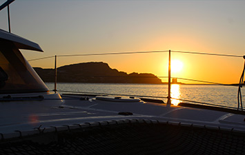 tramonto stintino catamarano
